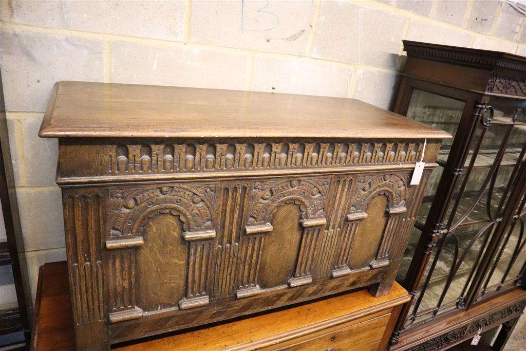 A small 18th century style oak coffer, width 106cm, depth 45cm, height 61cm